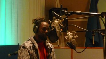 Vocalist recording with headphones
